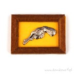 Pistolet w ramie