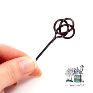 Miniaturowa trzepaczka do dywanów
