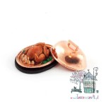 Miniaturowy kurczak na tacy